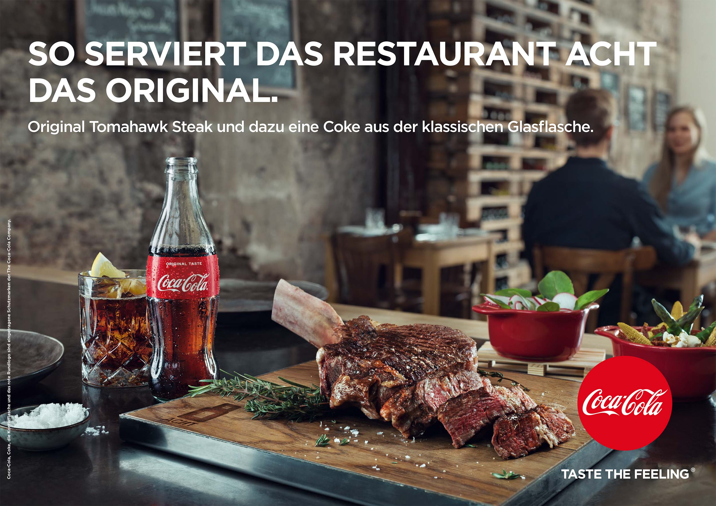 Meat and Coca-cola bottles in restaurant Acht with persons in background
