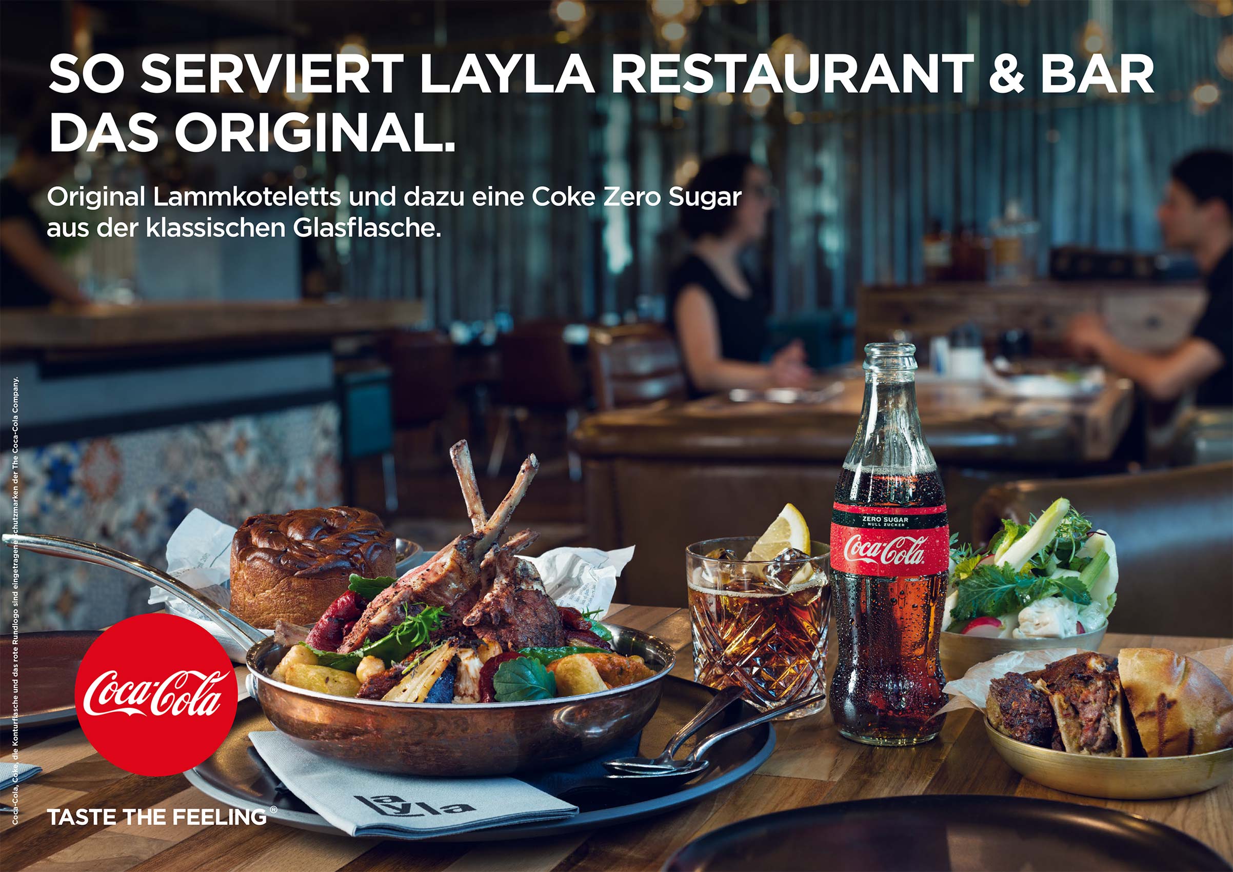 Israeli food and coca-cola on a table in restaurant Layla Berlin 